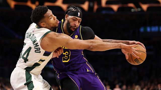 Milwaukee Bucks forward Giannis Antetokounmpo (34) defends Los Angeles Lakers forward Anthony Davis (3) during the third quarter at Crypto.com Arena.